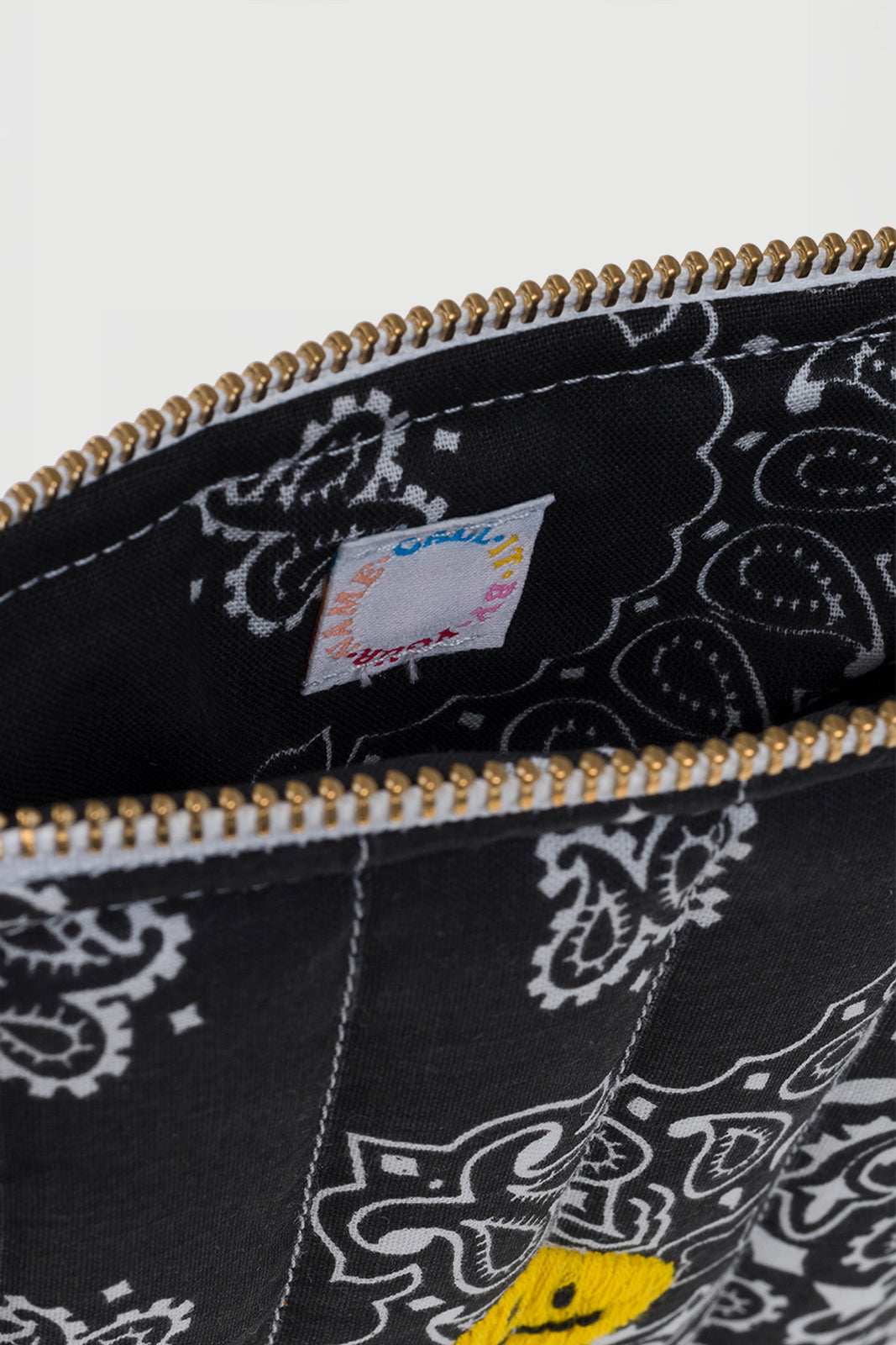 Mini Pochette Happy Face in Schwarz