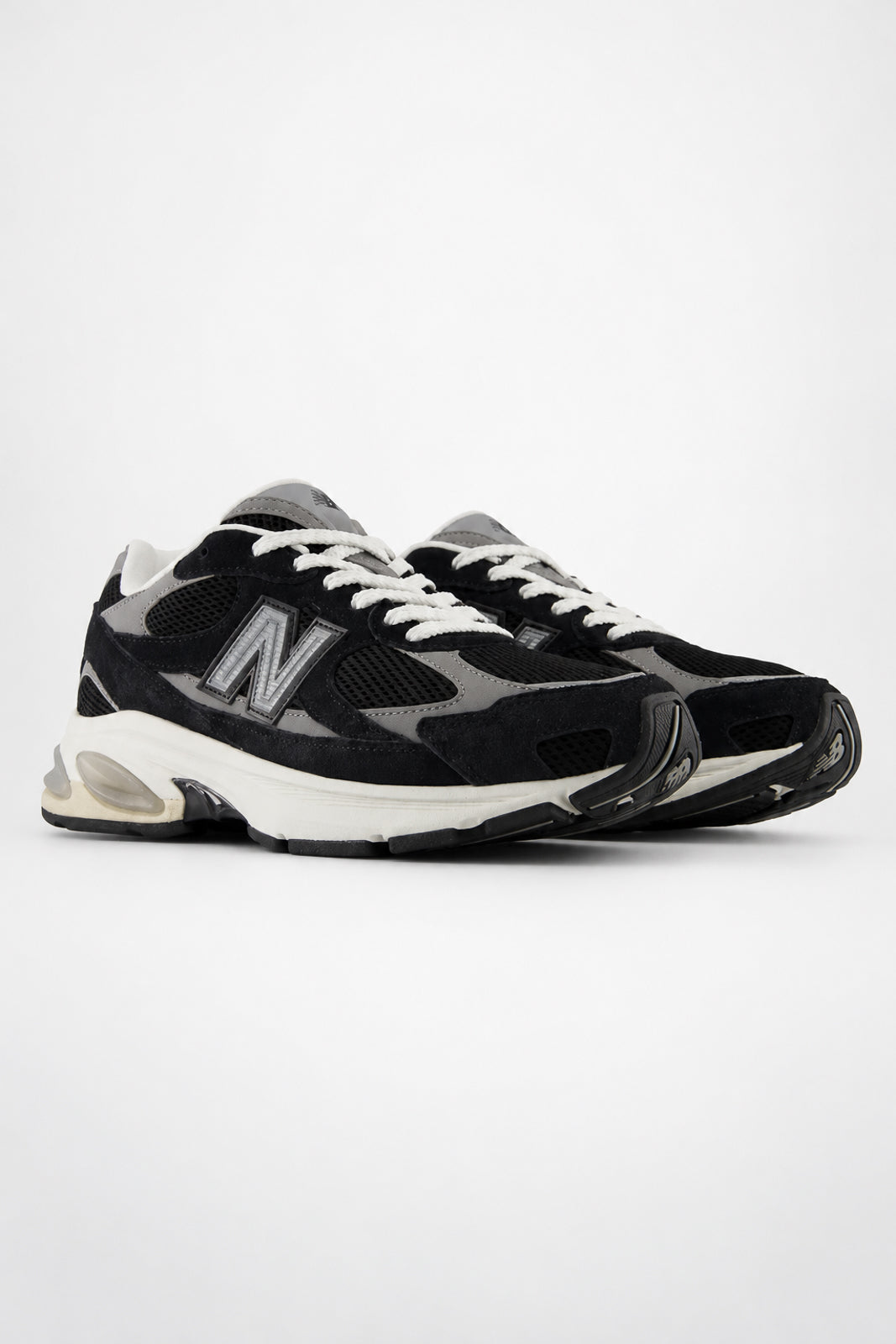 New Balance, Baskets 2010 en noir/gris ombre/sel de mer