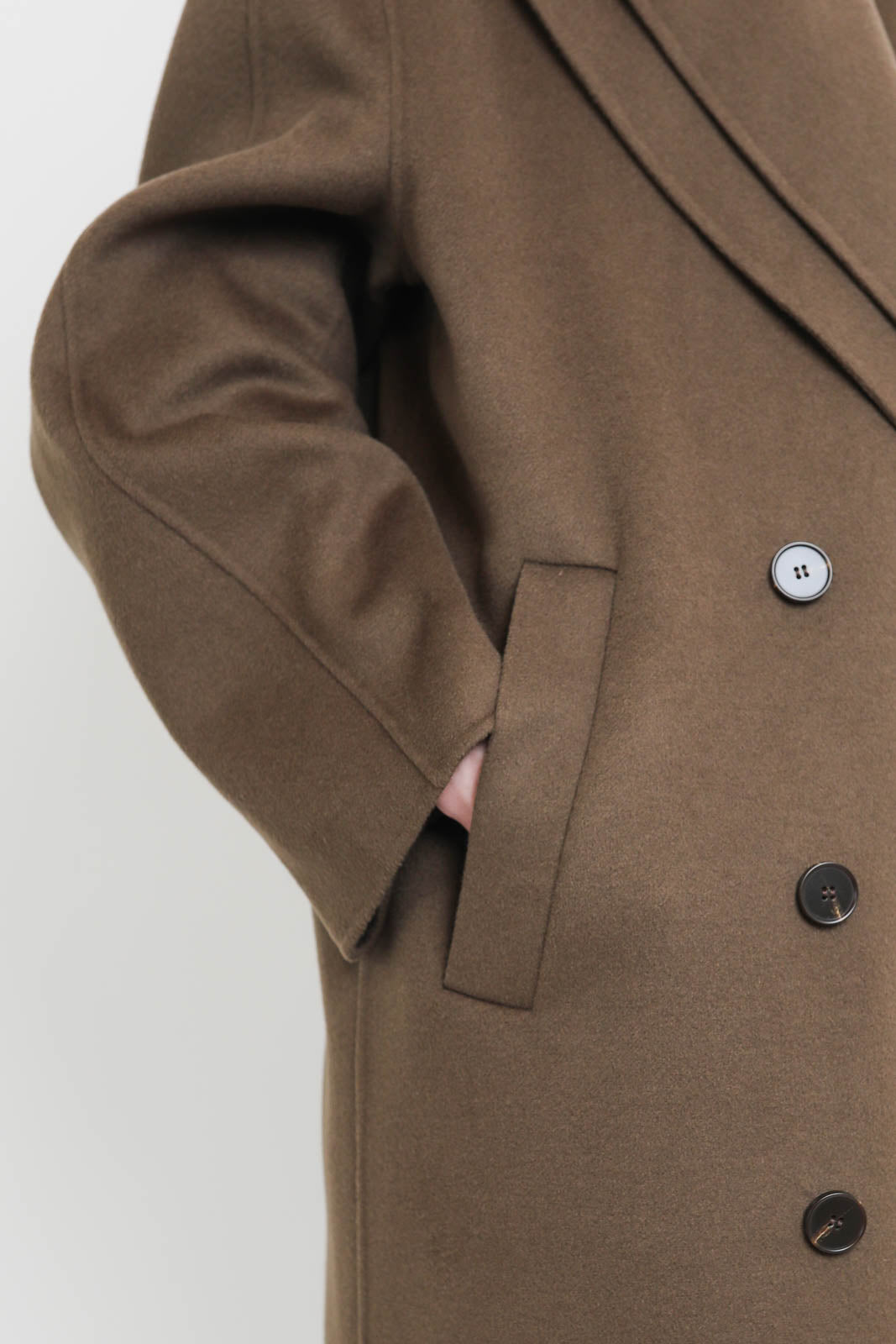 Raw, wool coat in taupe