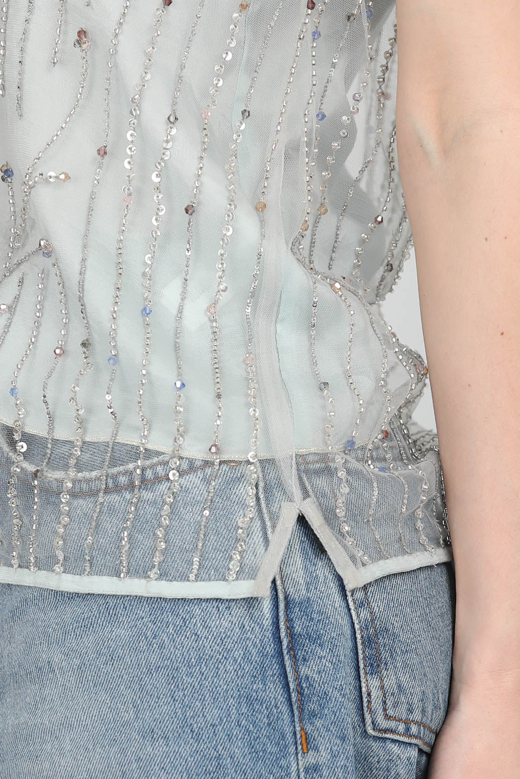 Top avec broderies en Firefly