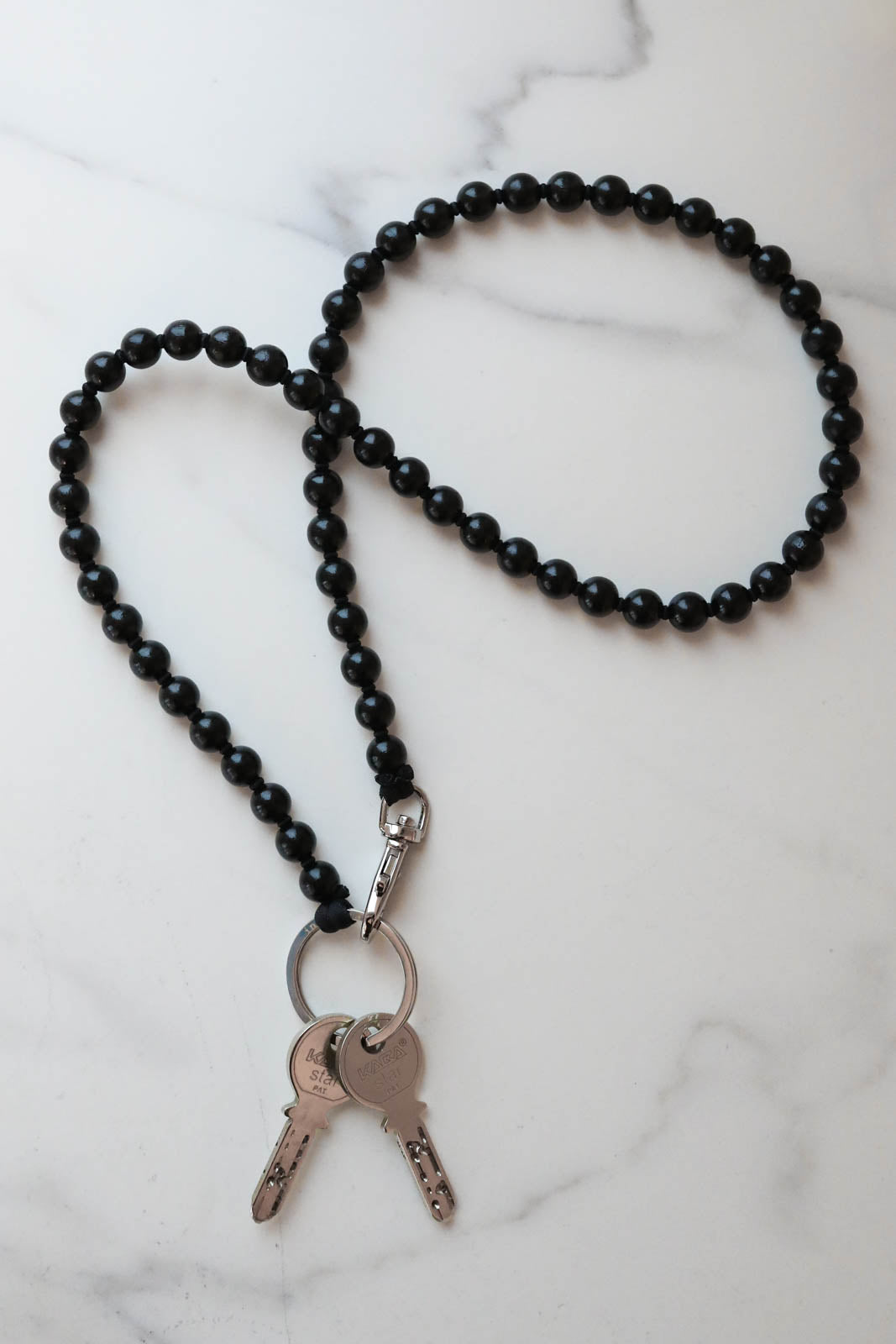 Ina Seifart, Schlüsselanhänger in Schwarz/Schwarz