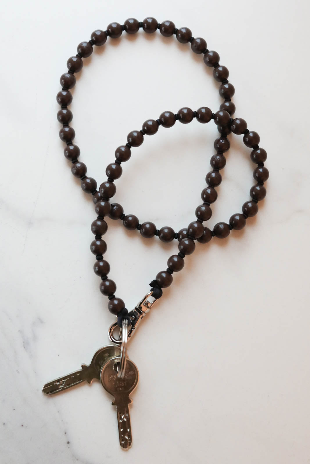 Ina Seifart, Schlüsselanhänger in Braun/Schwarz