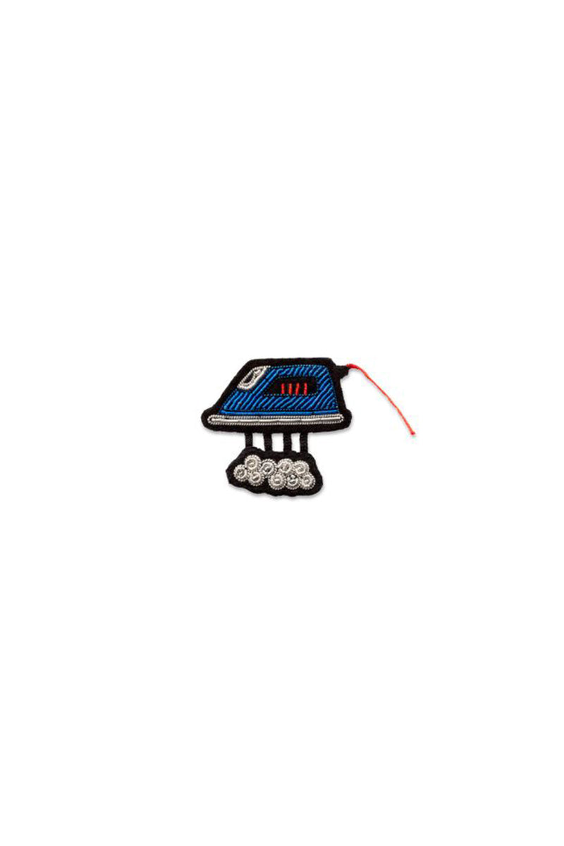 Brosche Streaming Iron in Blau