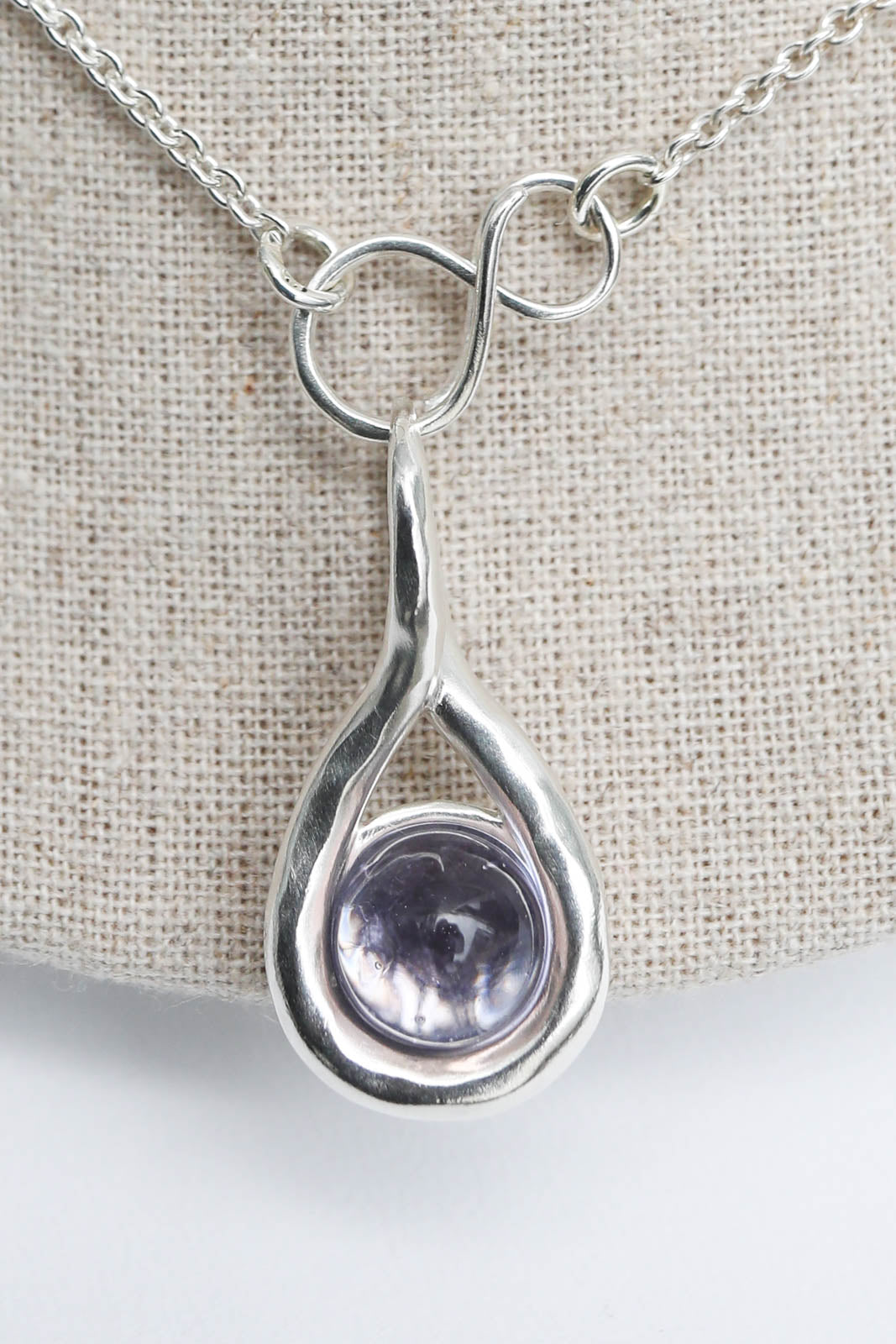 Eclipse pendant in pale blue/pink