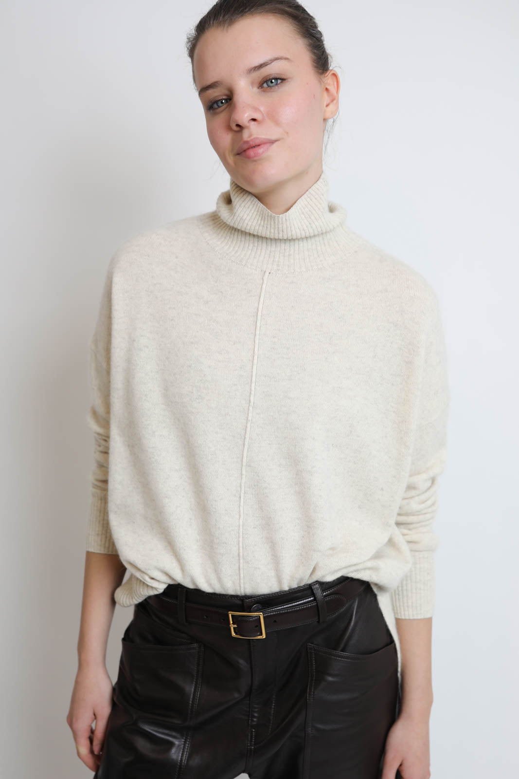 C. T. Plage, high neck sweater in ivory