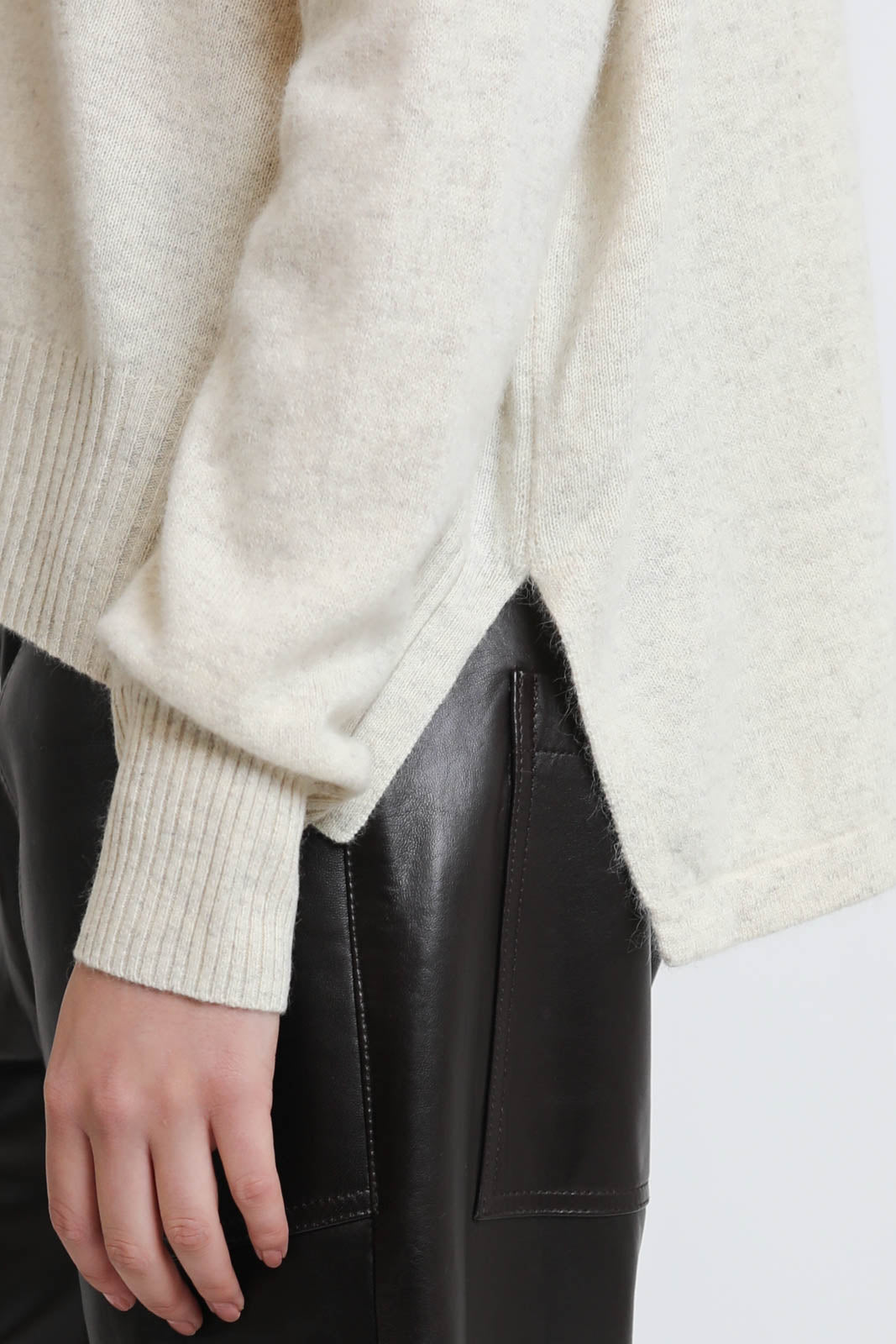 C. T. Plage, high neck sweater in ivory