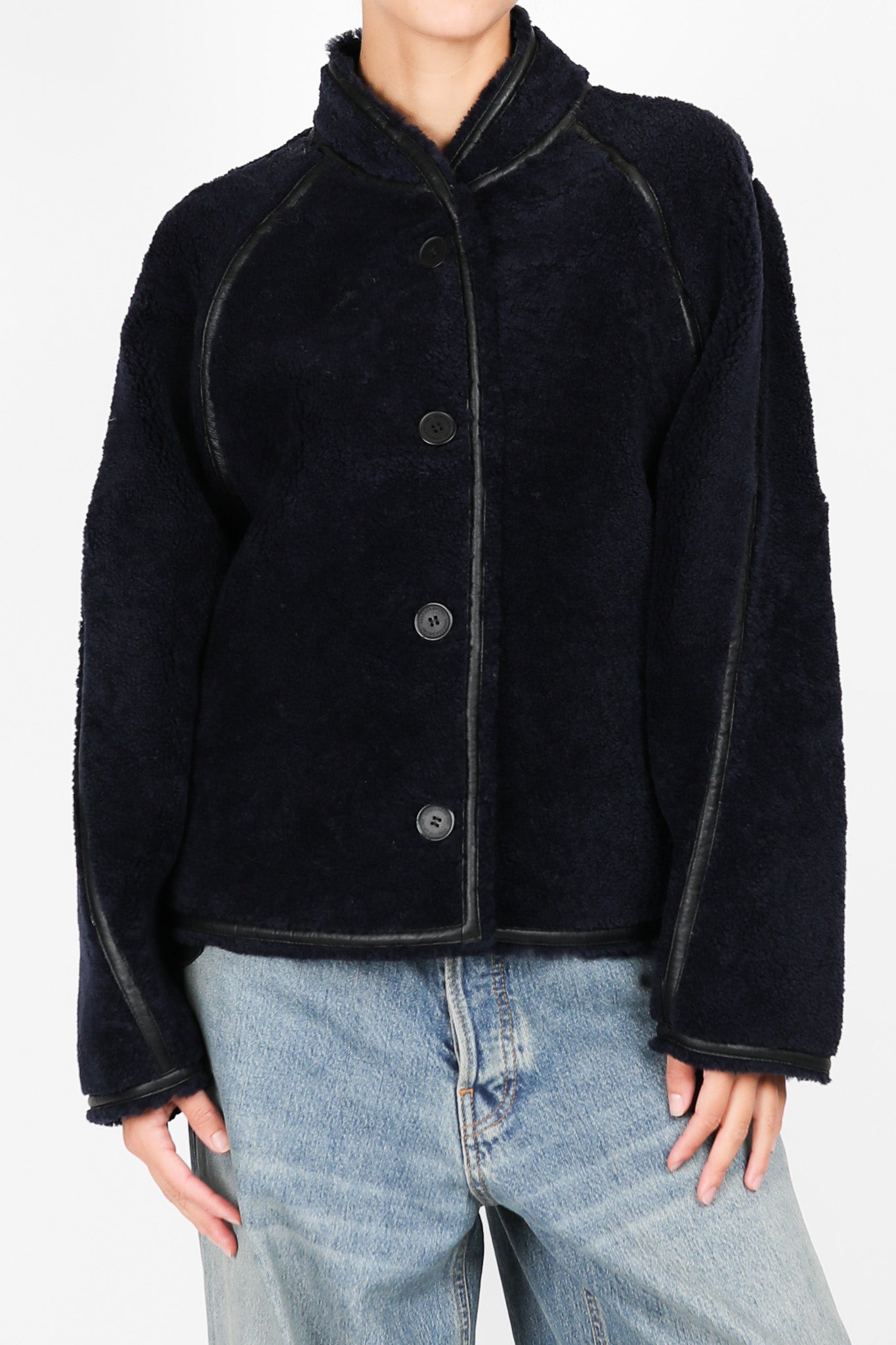 Dino jacket made from shearling in noir/navy