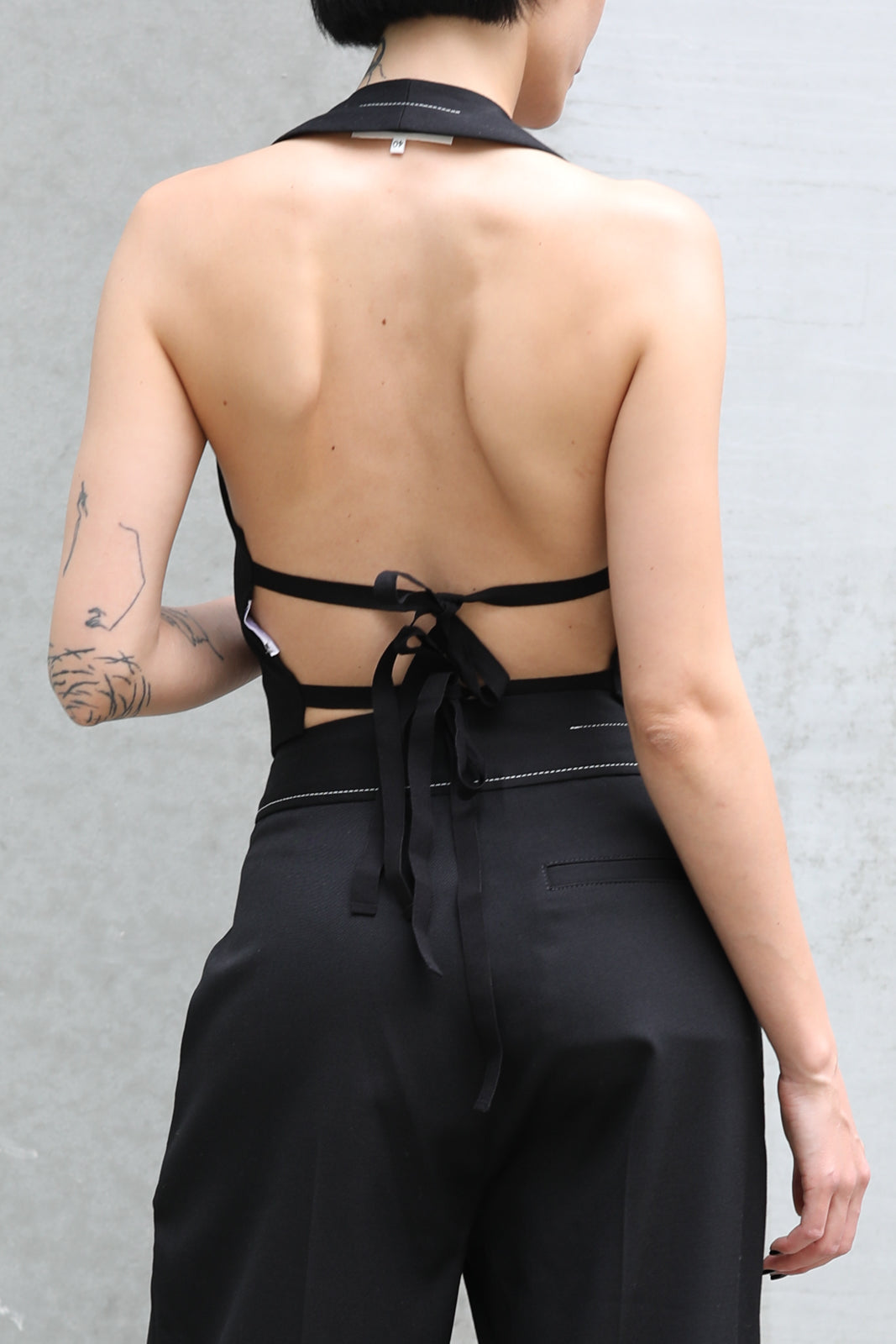 Backless vest in black