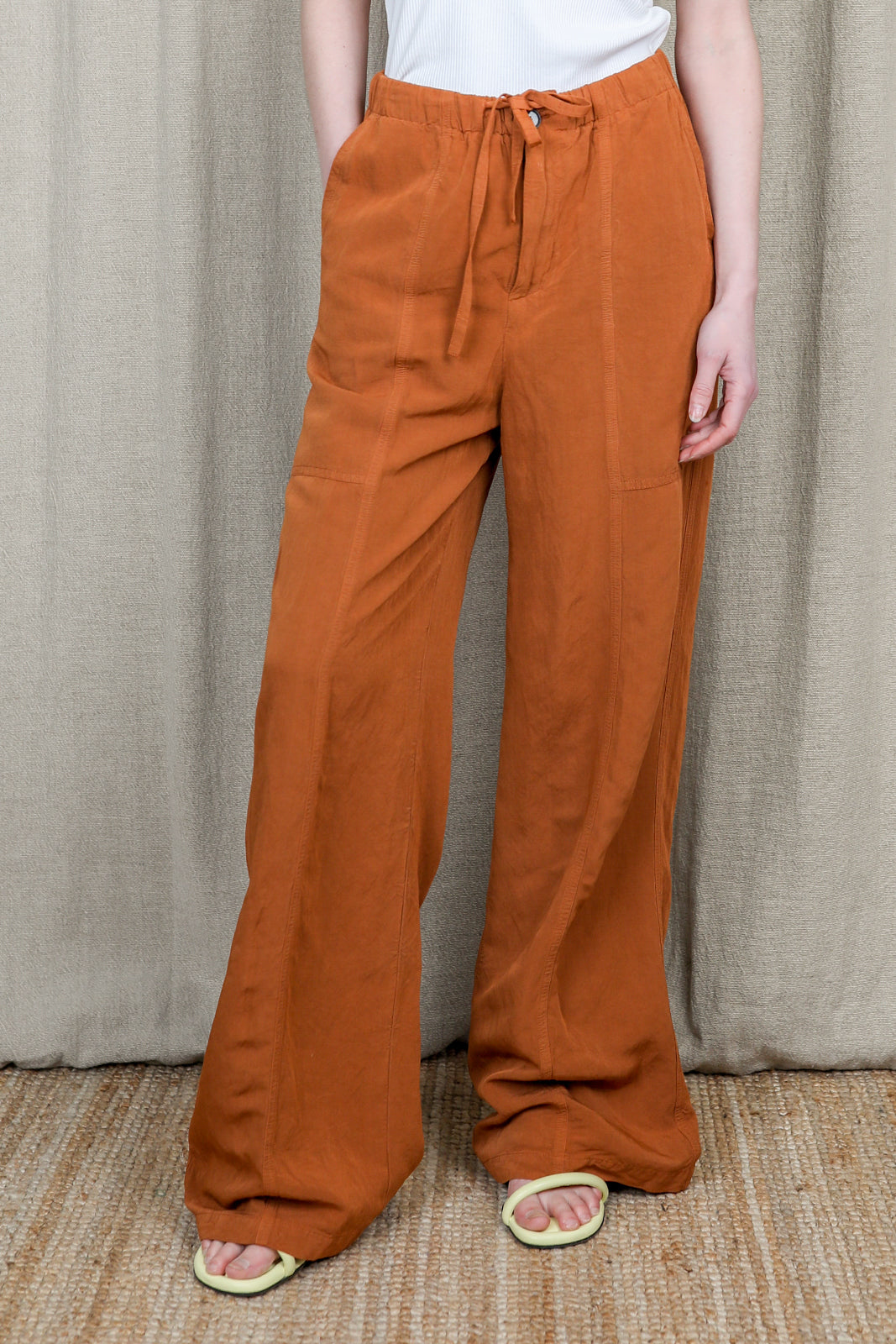 Wide-leg trousers in terracotta