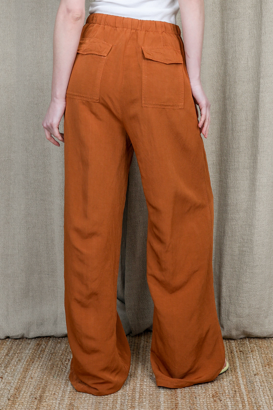 Wide-leg trousers in terracotta