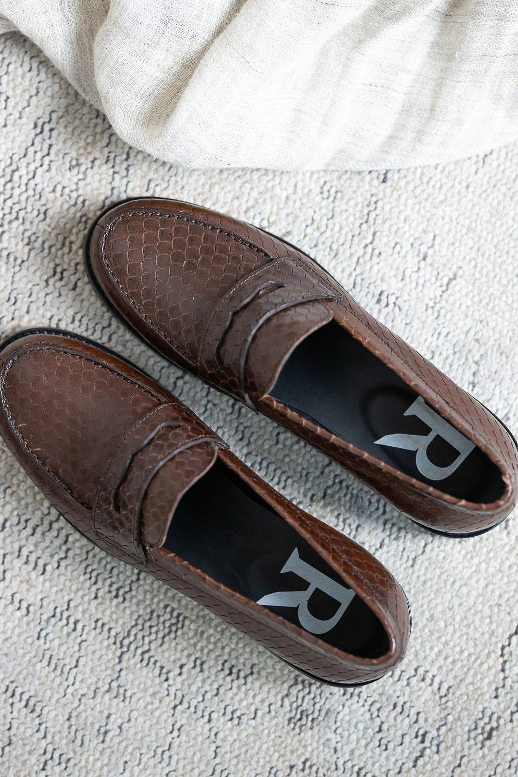 Embossed leather moccasins in Python Chocolat