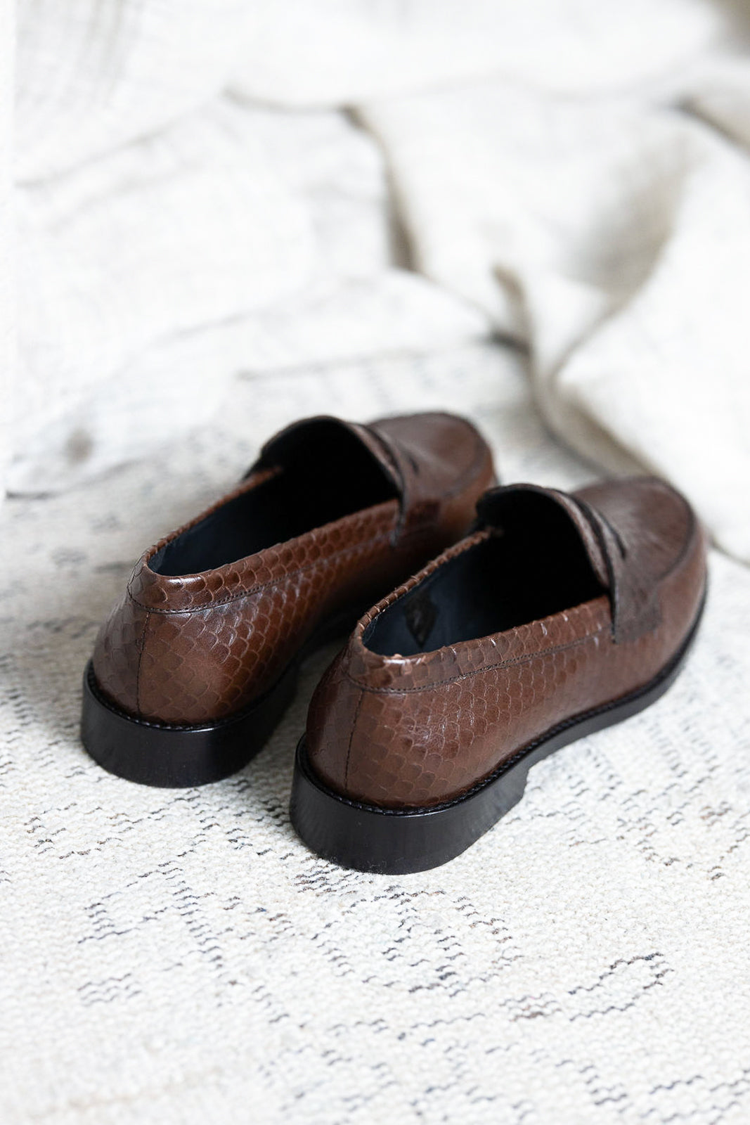 Embossed leather moccasins in Python Chocolat